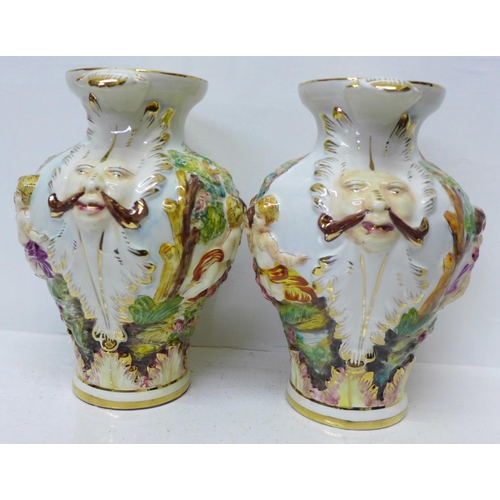 613 - A pair of Capodimonte vases, 28cm