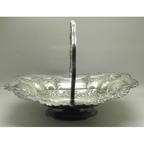 615 - A Victorian plated bowl with swing handle