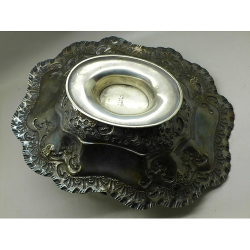 615 - A Victorian plated bowl with swing handle