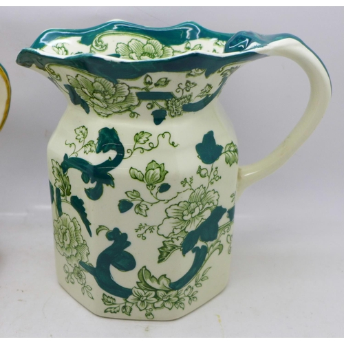 641 - A set of three Mason's Chartreuse graduated jugs