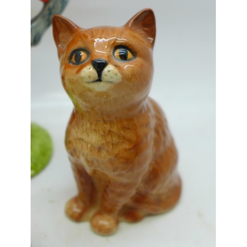 647 - Three Beswick cat figures, The Footballing Felines Collection Kitkat, Siamese cats and Kittens