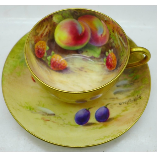 649 - A hand painted Royal Worcester cup and saucer, the saucer signed W H Austin and the cup signed R Aus... 