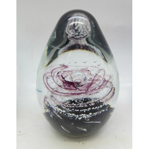 660 - Four glass paperweights including one handmade Molecular Cloud by Kenleys