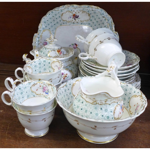 662 - An early Victorian Coalport tea set, six setting with cream, lidded sugar bowl, slop bowl and two se... 