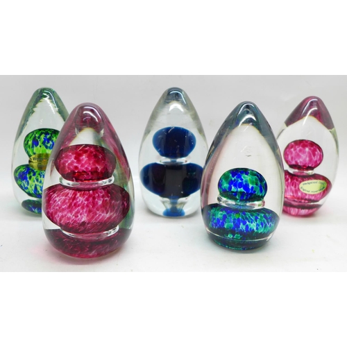 676 - Eight Wedgwood glass paperweights