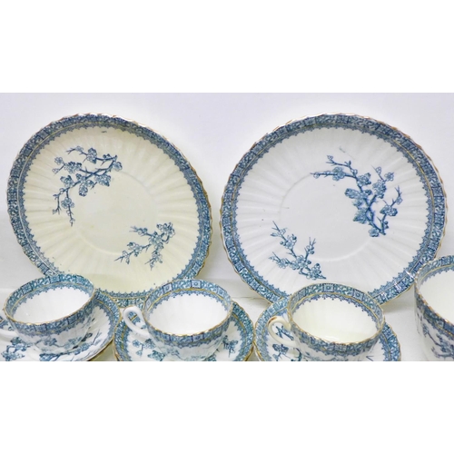 693 - An Edwardian twelve setting tea set, lacking one cup (three cups a/f)