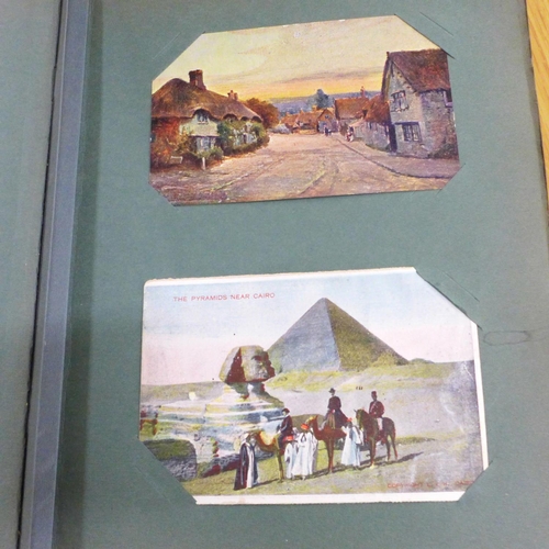 694 - Postcards; a vintage postcard album and collection (69)