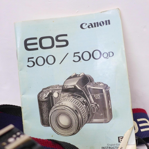 706 - A Canon EOS 500 camera body, Canon cap and strap and a Vivitar V635 body and strap