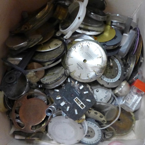 708 - A box of wristwatch and pocket watch parts, movements, cases, dials, etc.