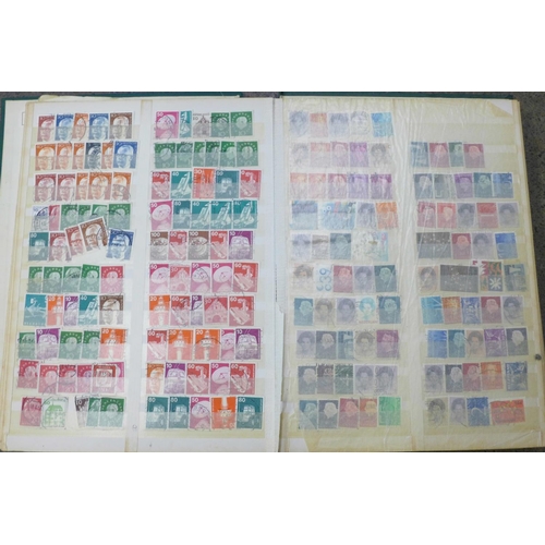 740 - Three albums of stamps