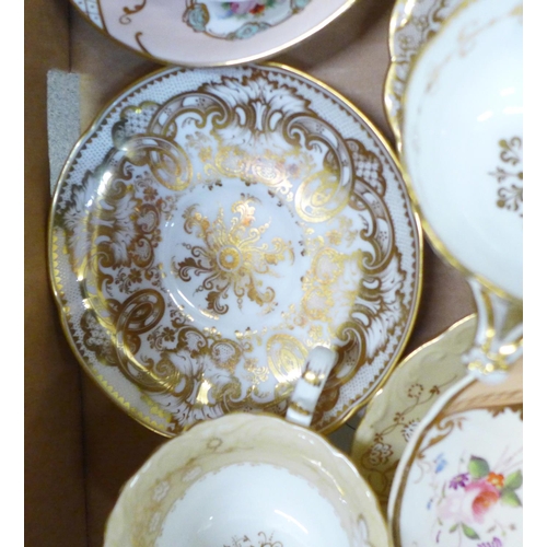 752 - A collection of English porcelain cups, saucers, many hand painted, 18th and 19th Century