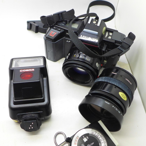 760 - A Minolta 5000 camera, with additional lens, flash, light meter, remote and bag