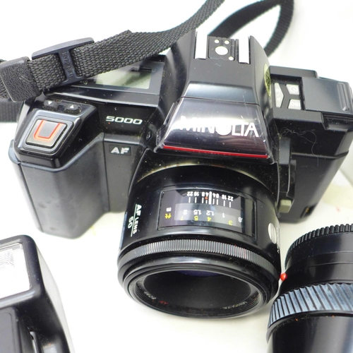 760 - A Minolta 5000 camera, with additional lens, flash, light meter, remote and bag