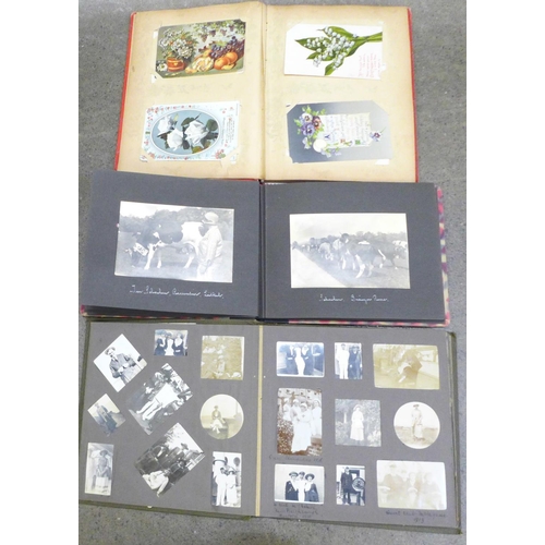 768 - Three albums of postcards and photographs, 1900-1930