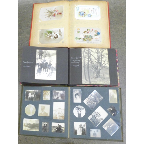 768 - Three albums of postcards and photographs, 1900-1930