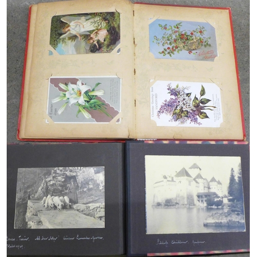 768 - Three albums of postcards and photographs, 1900-1930