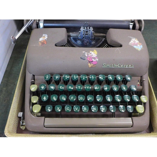 791 - A Smith-Corona typewriter, boxed with instructions and key