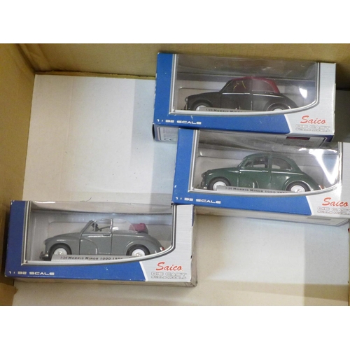 794 - Eleven die-cast Morris van model vehicles by Saico, boxed