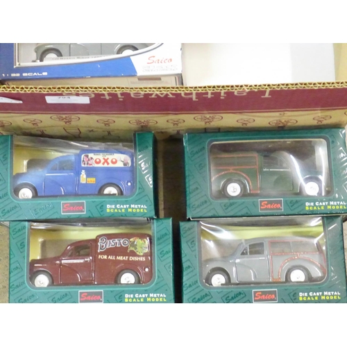 794 - Eleven die-cast Morris van model vehicles by Saico, boxed