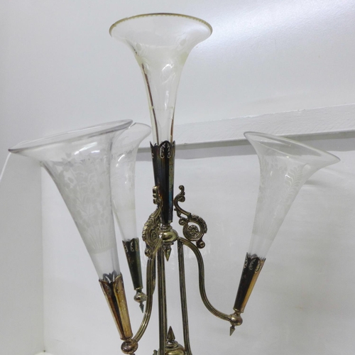 811 - A large epergne with Walker & Hall silver plated stand and four etched glass trumpets, one trumpet a... 