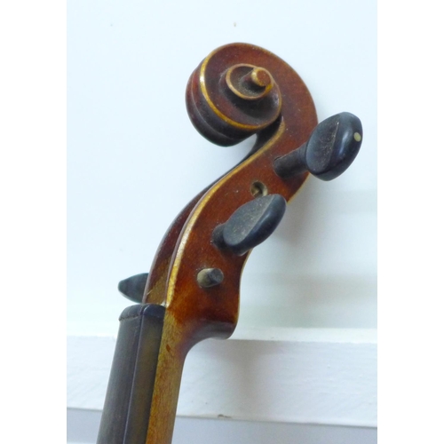 824 - A cased violin, length of back 36cm, case is a/f (front has come away from sides)