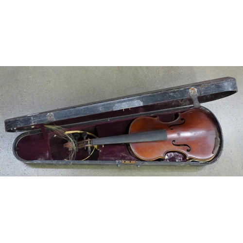 824 - A cased violin, length of back 36cm, case is a/f (front has come away from sides)