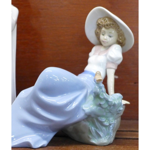 830 - Four Nao/Lladro figurines. “Listening to the Bird Song” (ref 02001042), “Girl Holding Dove” (ref 020... 