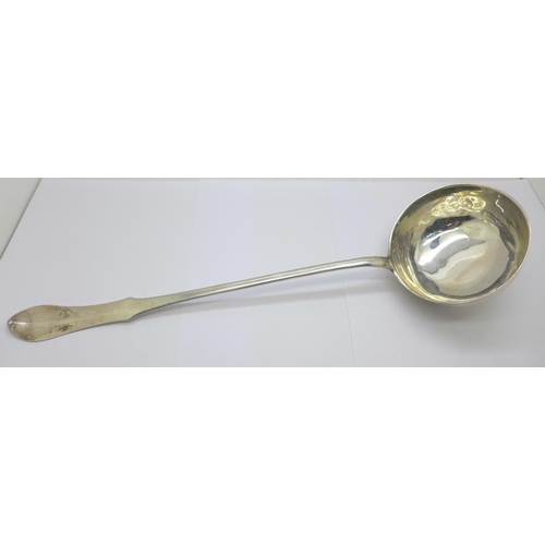 844 - A large continental silver ladle, possibly German, 205g, bowl dented