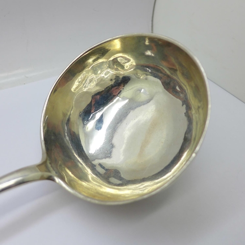 844 - A large continental silver ladle, possibly German, 205g, bowl dented