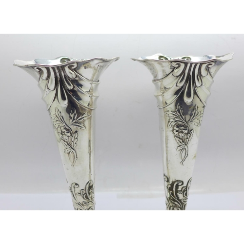 848 - A pair of Victorian silver vases, Birmingham 1899, 18cm, weighted