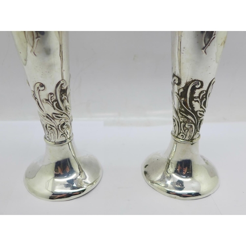 848 - A pair of Victorian silver vases, Birmingham 1899, 18cm, weighted