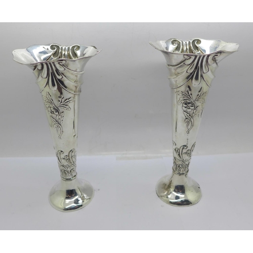 848 - A pair of Victorian silver vases, Birmingham 1899, 18cm, weighted