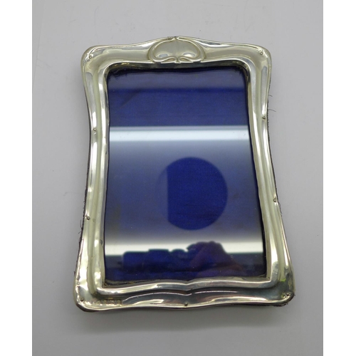 869 - An Art Nouveau silver photograph frame, Birmingham 1902, height 16cm