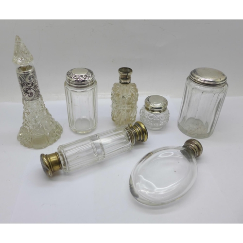 871 - Two silver topped glass jars, a silver mounted scent bottle, a double scent bottle, a/f, an oval bot... 