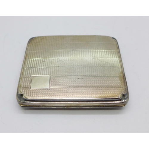 878 - A silver cigarette case, Birmingham 1935, 76g