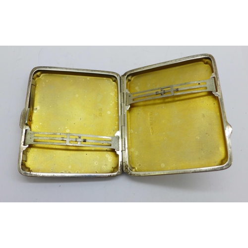 878 - A silver cigarette case, Birmingham 1935, 76g