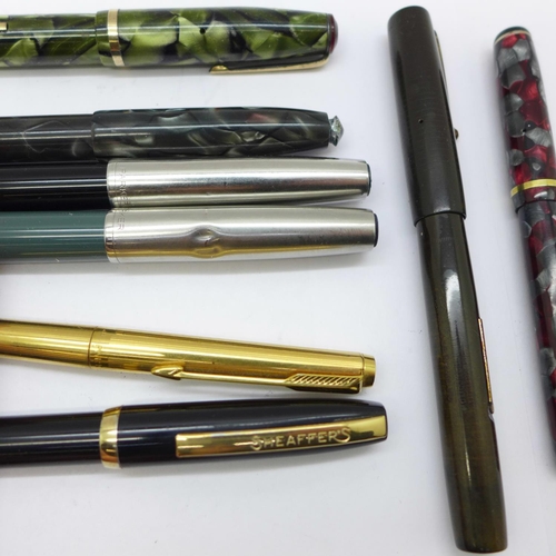 880 - Four pens with 14ct gold nibs; Conway Stewart 15, Blackbird self-filler, Wearever in green marble an... 