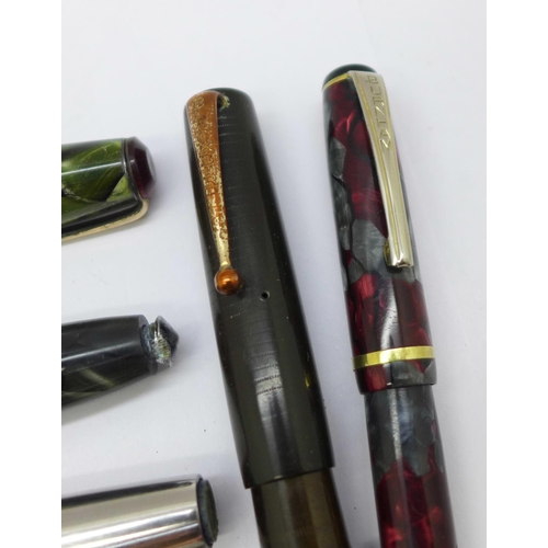 880 - Four pens with 14ct gold nibs; Conway Stewart 15, Blackbird self-filler, Wearever in green marble an... 