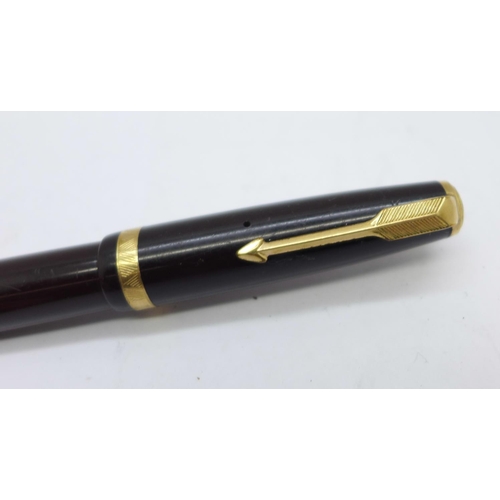 882 - A Parker Duofold pen with 14k nib and pump action