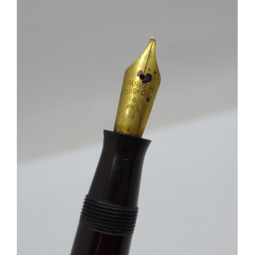 882 - A Parker Duofold pen with 14k nib and pump action