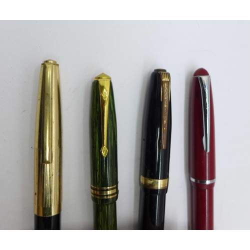 885 - Two fountain pens with 14ct gold nibs, Conway Stewart 36 in green and Waterman's 515 in black and tw... 