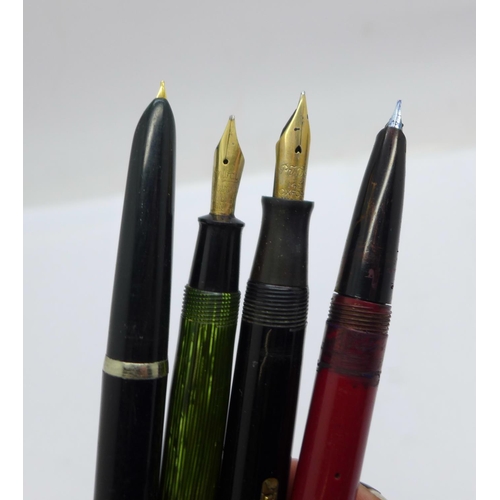 885 - Two fountain pens with 14ct gold nibs, Conway Stewart 36 in green and Waterman's 515 in black and tw... 