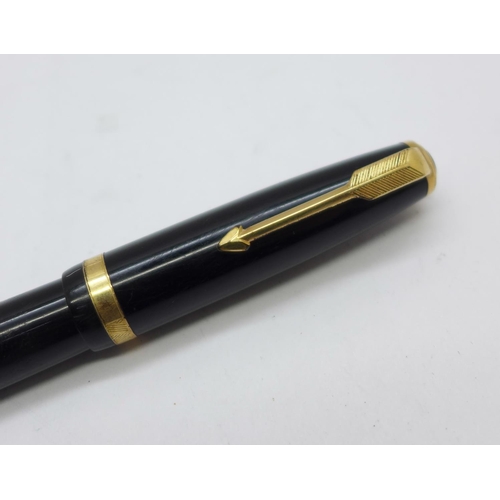 891 - A Parker Duofold pen with 14k nib and pump action