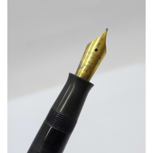 891 - A Parker Duofold pen with 14k nib and pump action