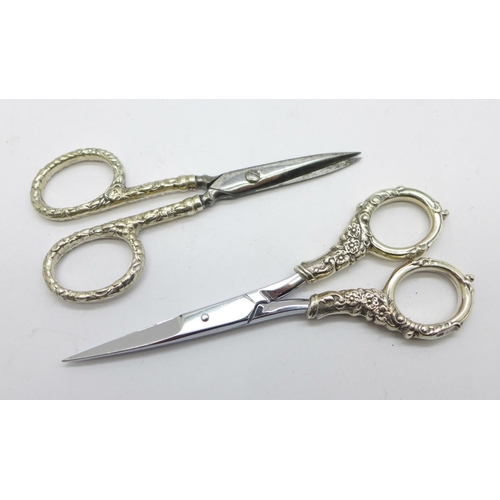 892 - Two pairs of silver handled manicure scissors, one marked 925, one marked Sterling