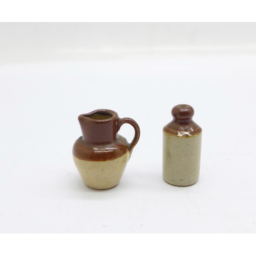 915 - A miniature Bourne Denby bottle and a jug, bottle 21mm