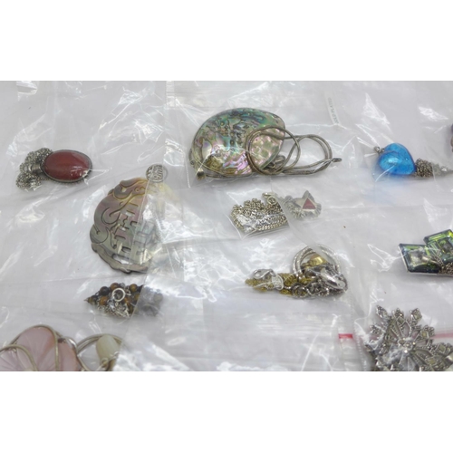 931 - Silver necklets and silver and silver mounted pendants and chains, eighteen in total