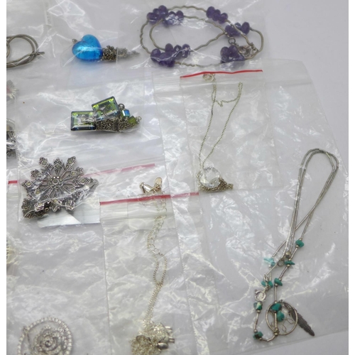 931 - Silver necklets and silver and silver mounted pendants and chains, eighteen in total