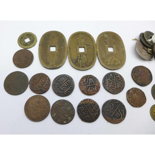 932 - A collection of coins including Chinese and Indian including one silver