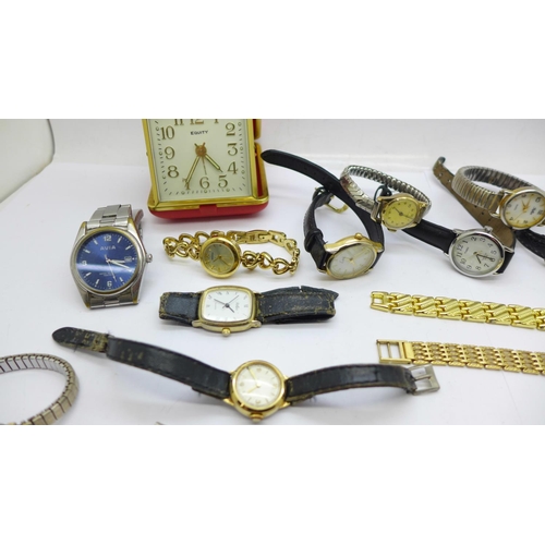 966 - A collection of wristwatches and a travel clock